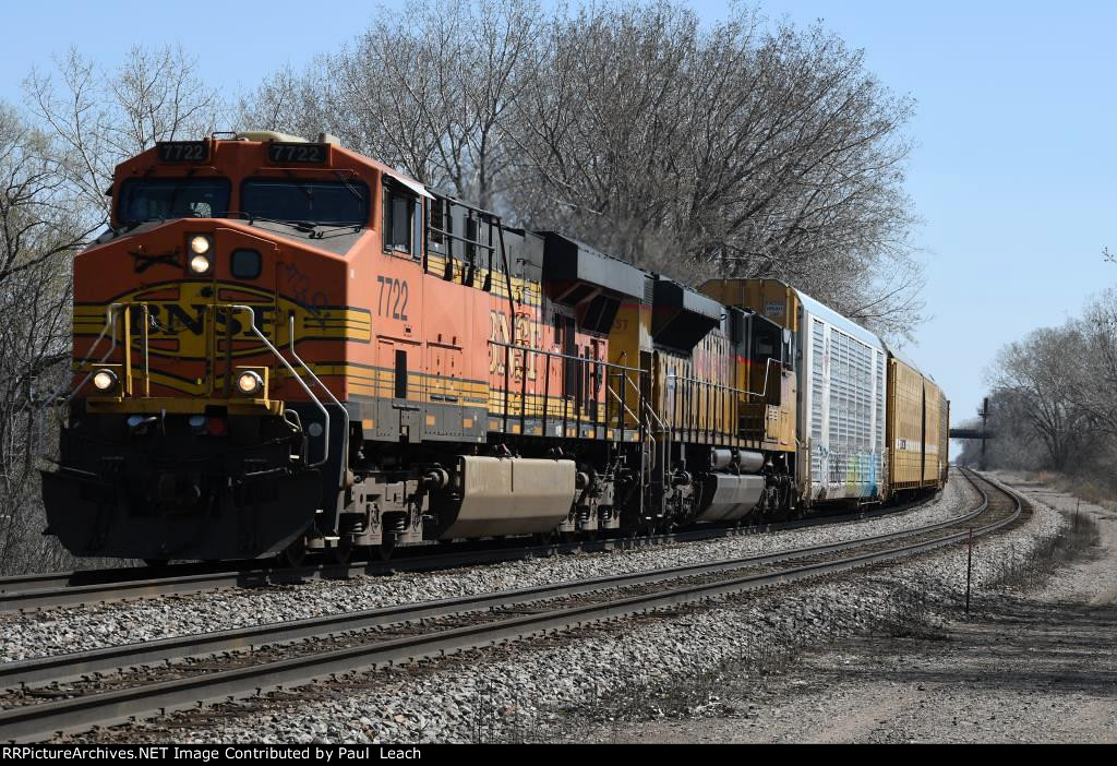 Westbound vehicle train rolls through Union